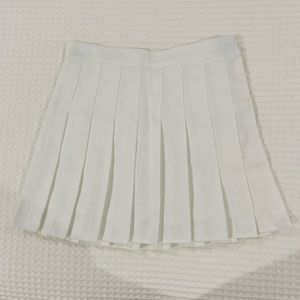 White pleaded tennis skirt